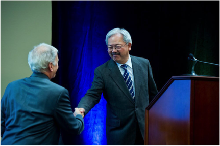 The Honorable Edwin Lee (right), mayor of the City and County of San Francisco, introduces Warren Browner, MD, MPH, chair of the San Francisco section of the Hospital Council of Northern and Central California, at the 2016 SFHIP Community Health Needs Assessment breakfast on September 27, 2016.