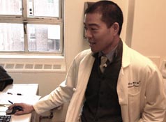 Elvin Geng, MD, in his office