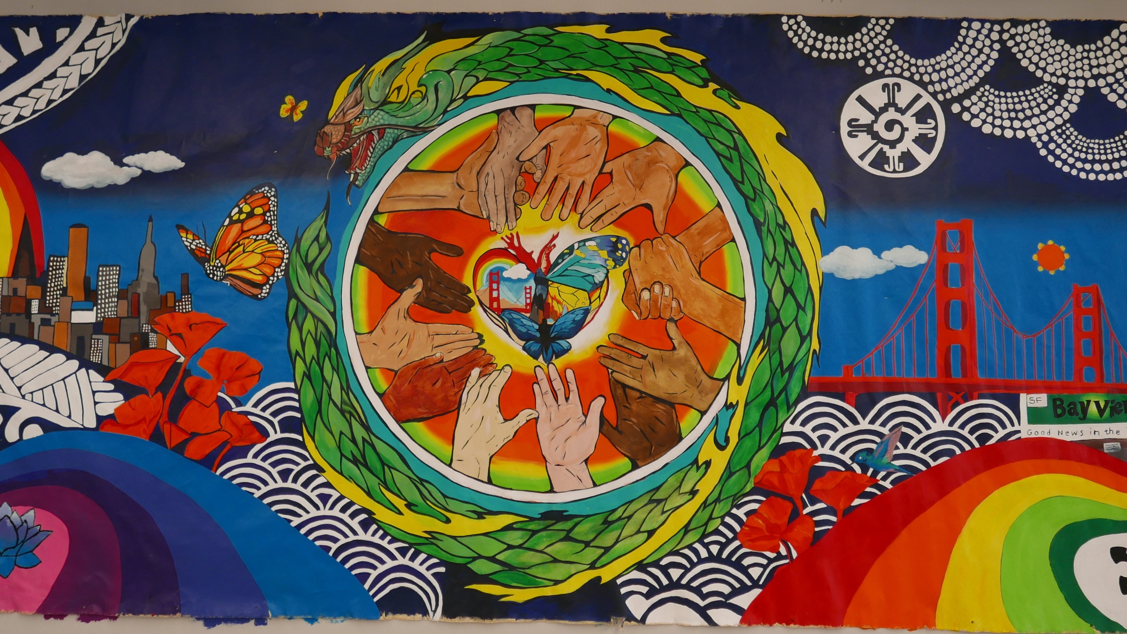 Mural of SF motifs, hands, heart