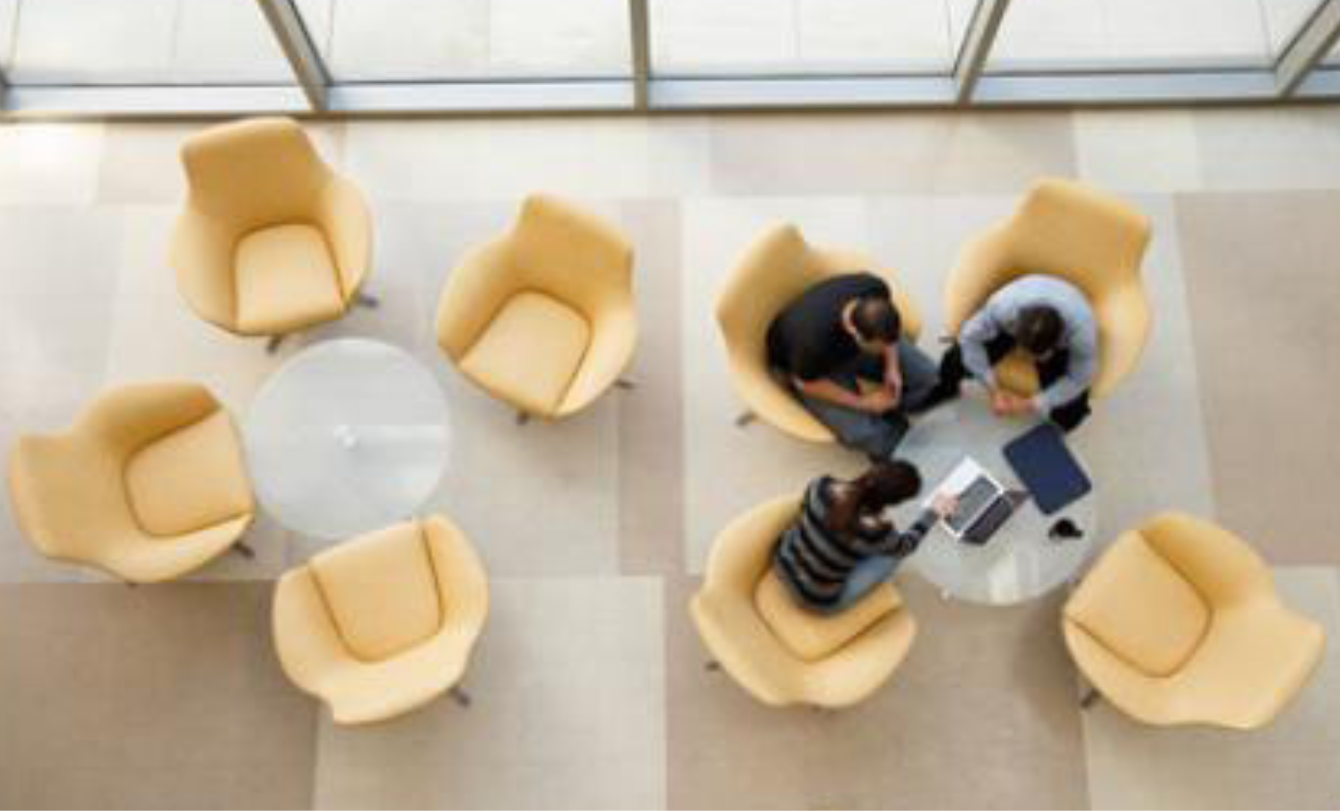 Chairs with peoples sitting around in a circle